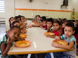 Brazilian children at school at lunchtime.